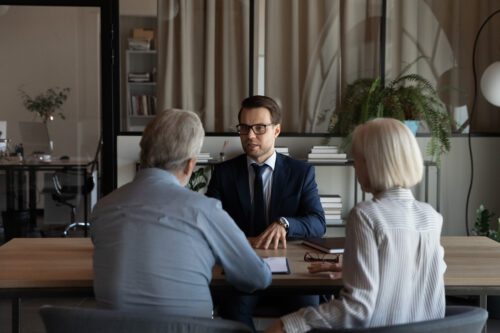 couple talking to a wealth consultant