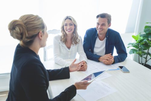 A couple meeting with their banker