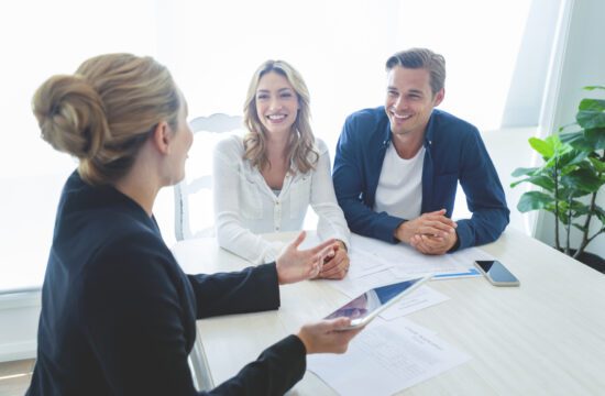 A couple meeting with their banker