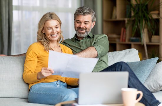 Husband and wife reviewing finances