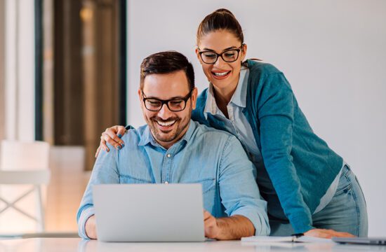 Couple looking at computer